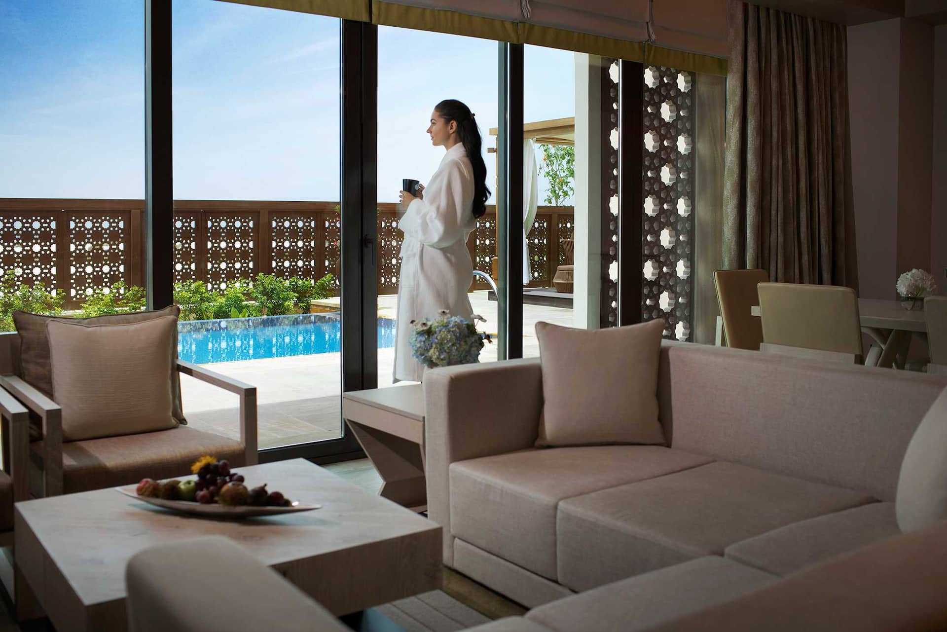 guest in a saadiyat rotana resort room