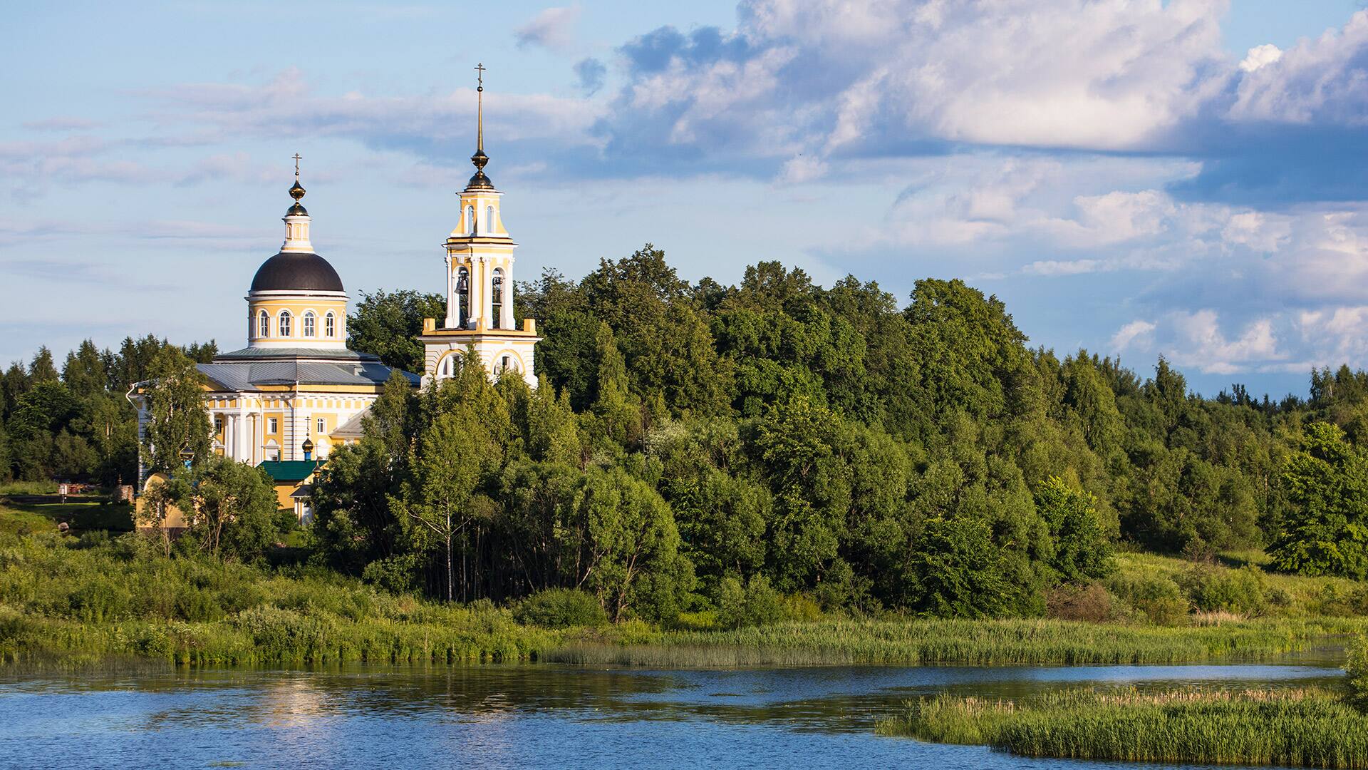 Churches and shoreline seen from river cruise ship Excellence Katharina of Reisebüro Mittelthurgau (formerly MS General Lavrinenkov), Volga river, Russia