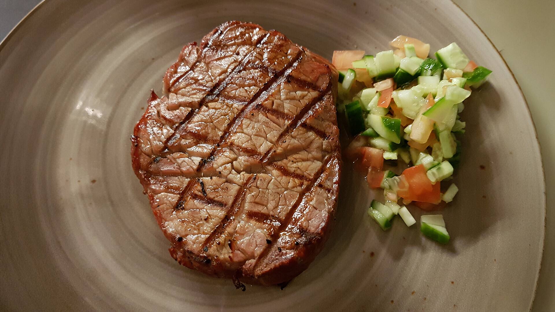 Kosher meat, grilled beef tenderloin with tomato & cucumber salad 