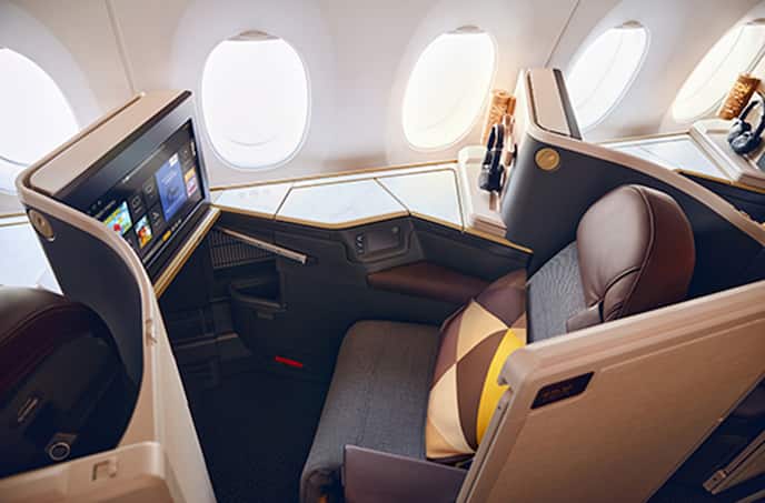 https://www.etihad.com/content/dam/eag/etihadairways/etihadcom/2025/global/products/our-fleet/a350/a350-business-cabin.jpg?imwidth=480&imdensity=1