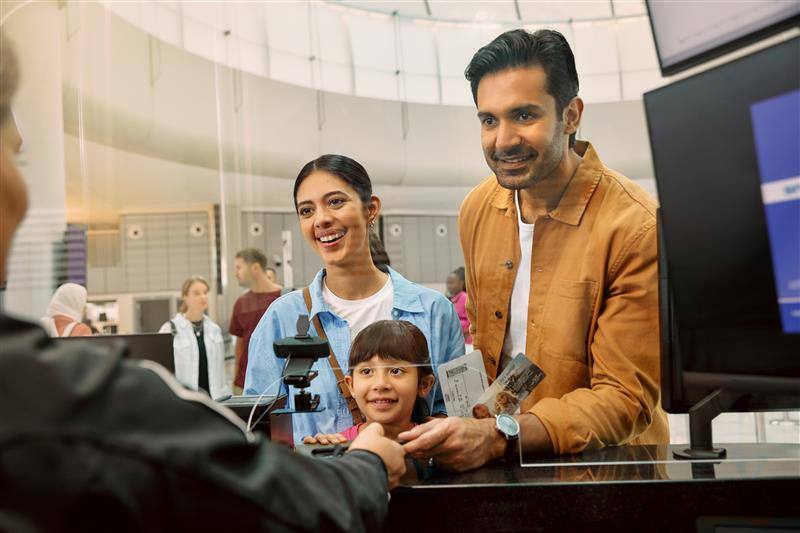 economy check-in counter with family