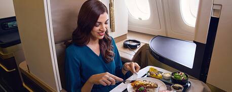 A380 Business cabin lady eating