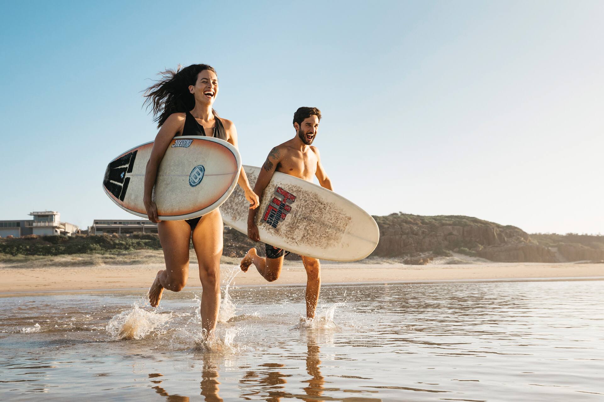 bird eye view of manly beach with cliffs and clear blue sea in sydney 