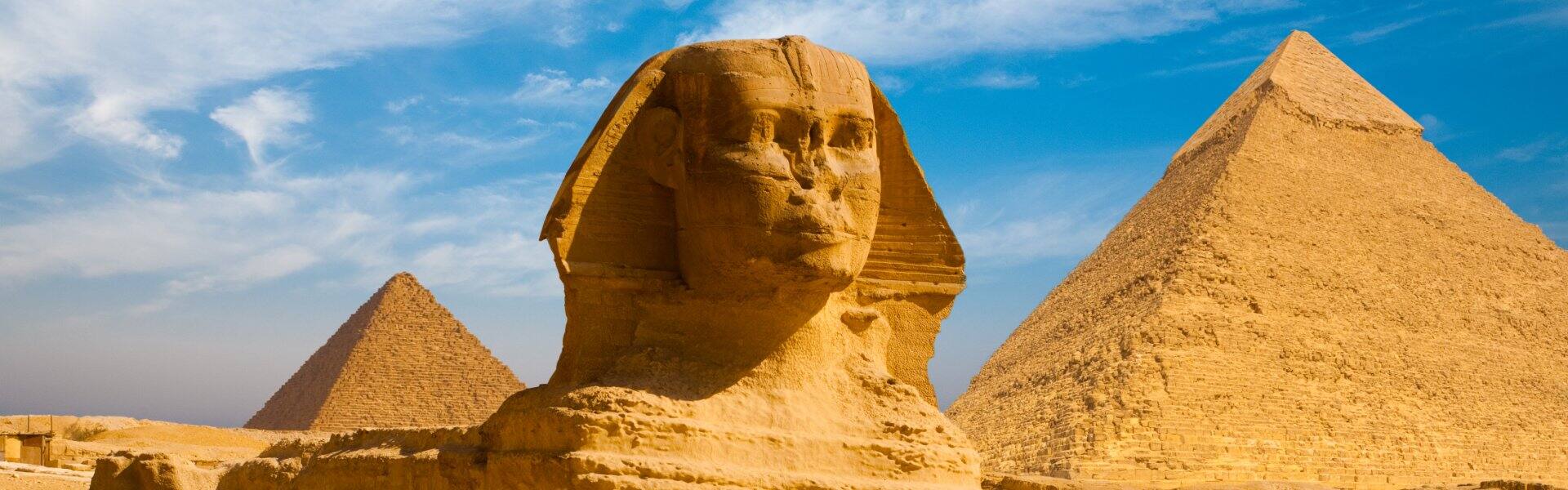 the sphinx and pyramids at giza in egypt