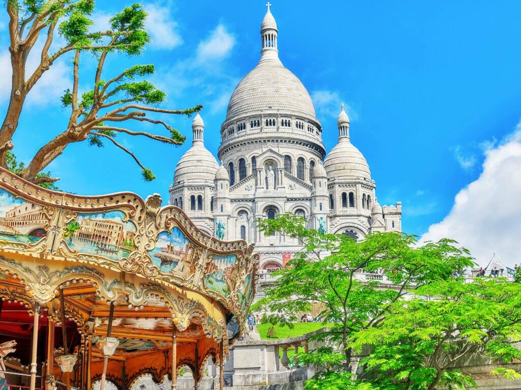 the white domes of the sacre coeur cathedral on a sunny day in paris france 
