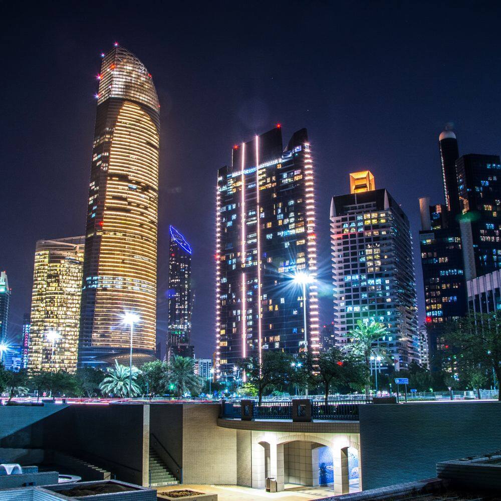 the abu dhabi skyline at night 