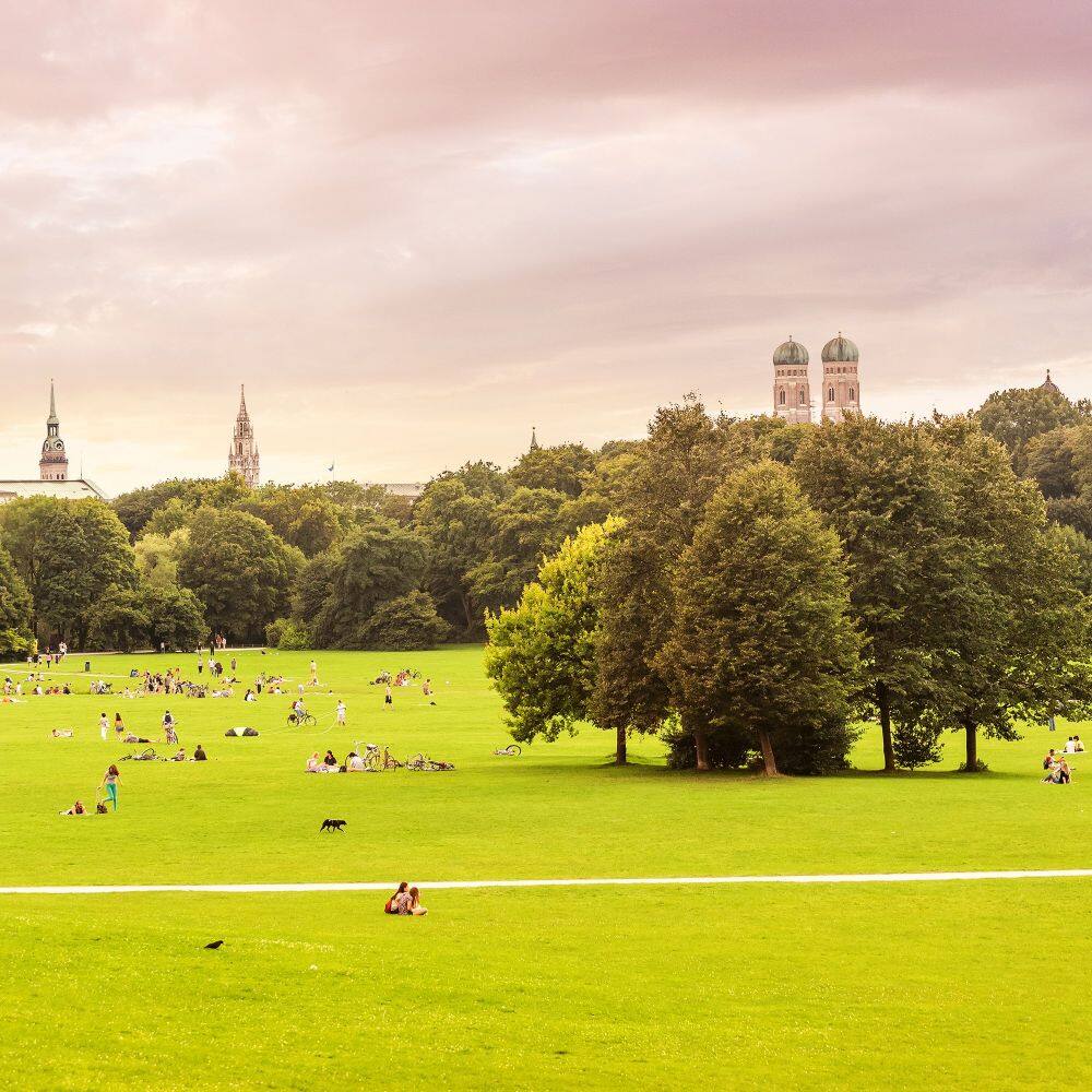 the english garden and city skyline in munich