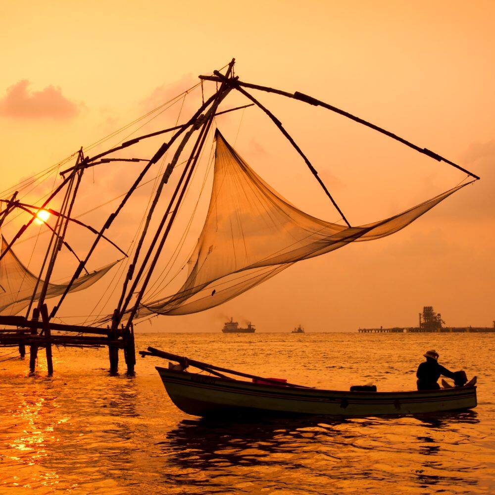 fishing nets and boats at sea in india