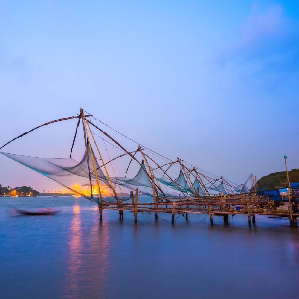 fishing nets on the coast at sunrise kochi