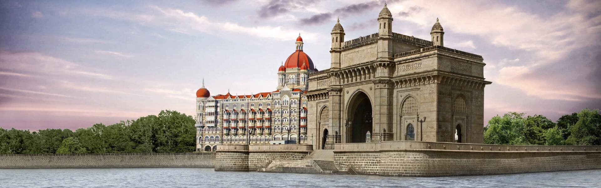 view of the gateway to india in mumbai as the sun begins to set