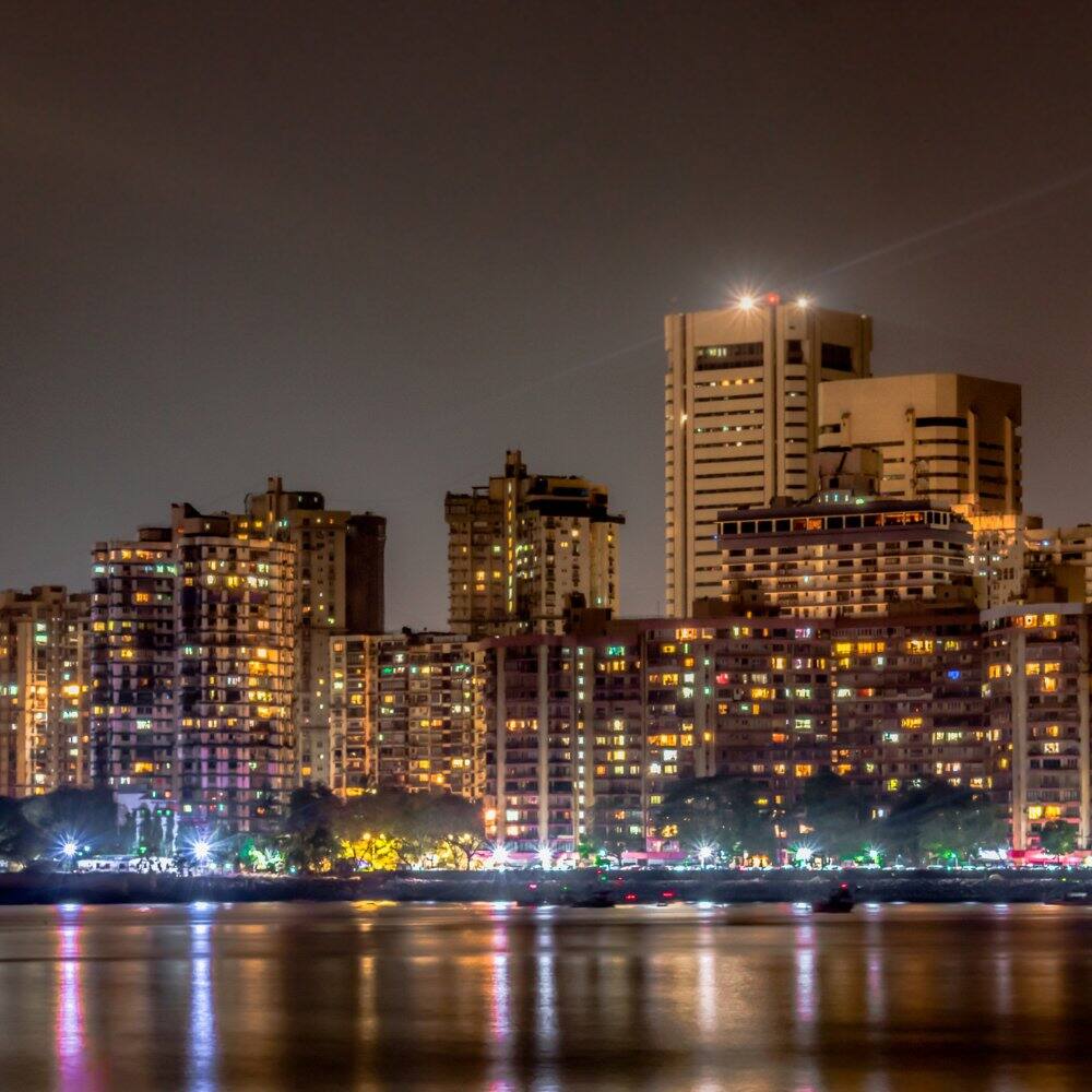 busy and vibrant street in front of chhatrapati shivaji terminus in india