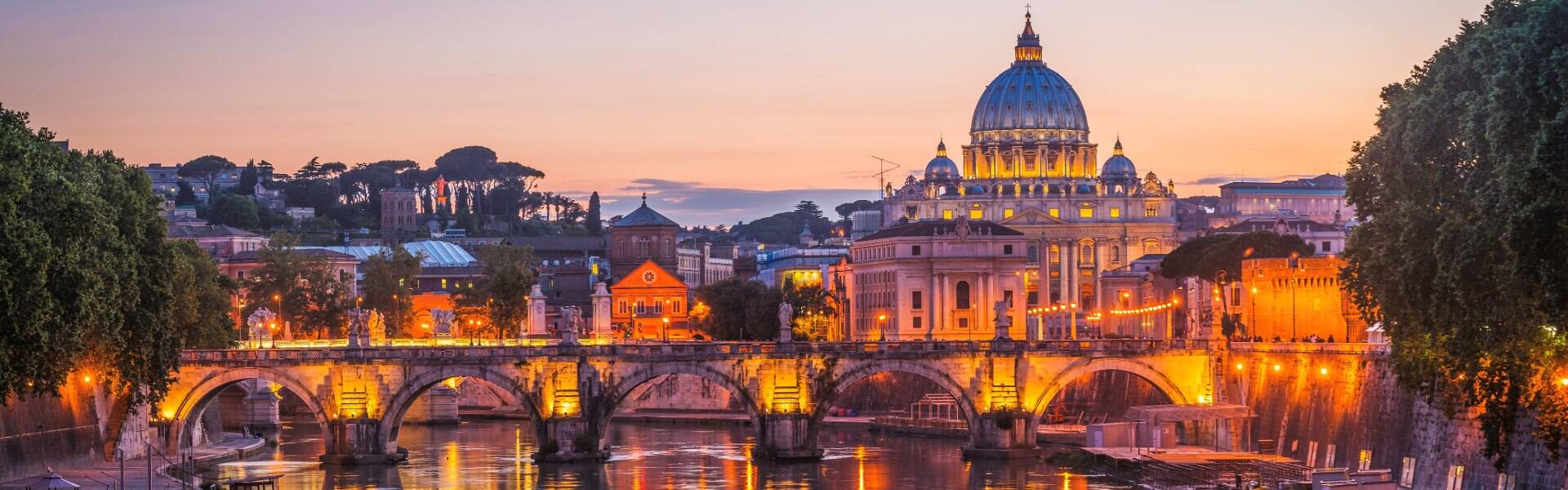 sunset over tiber and st peters basilica rome italy 