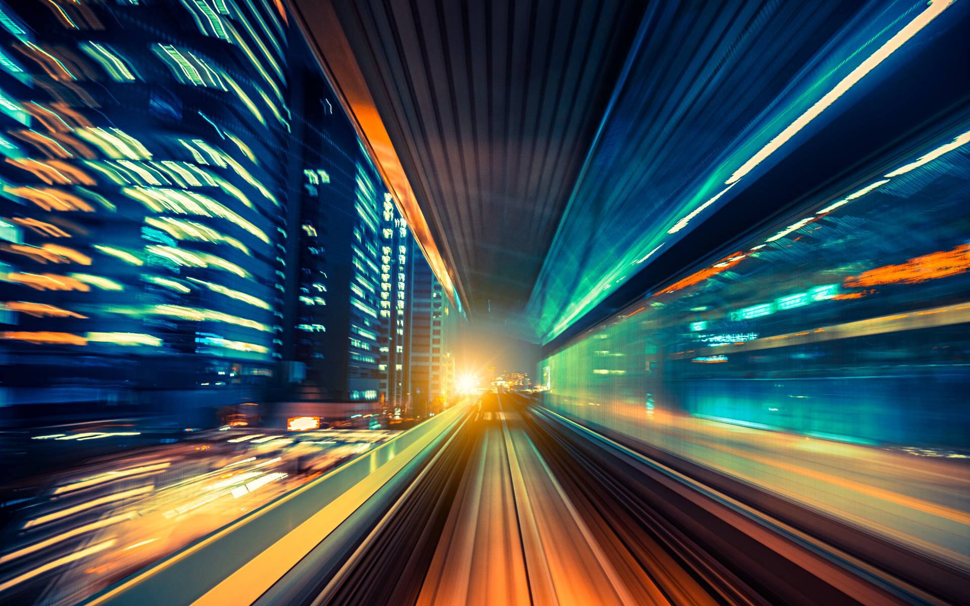 japan moving train at night