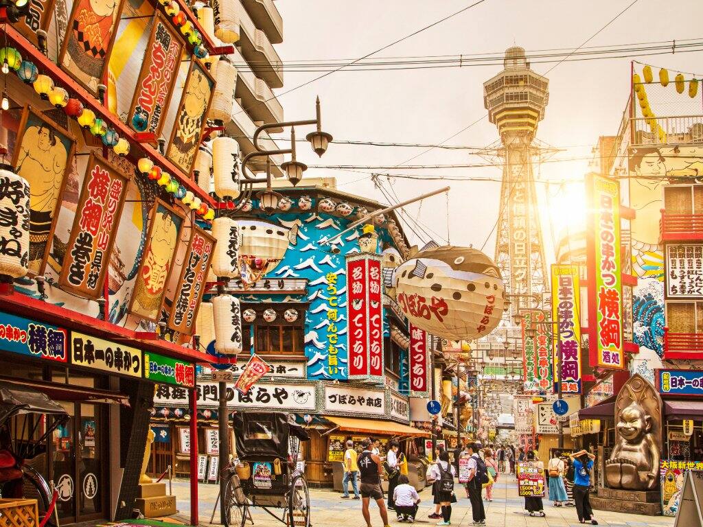 japan sutenkaku tower people on street