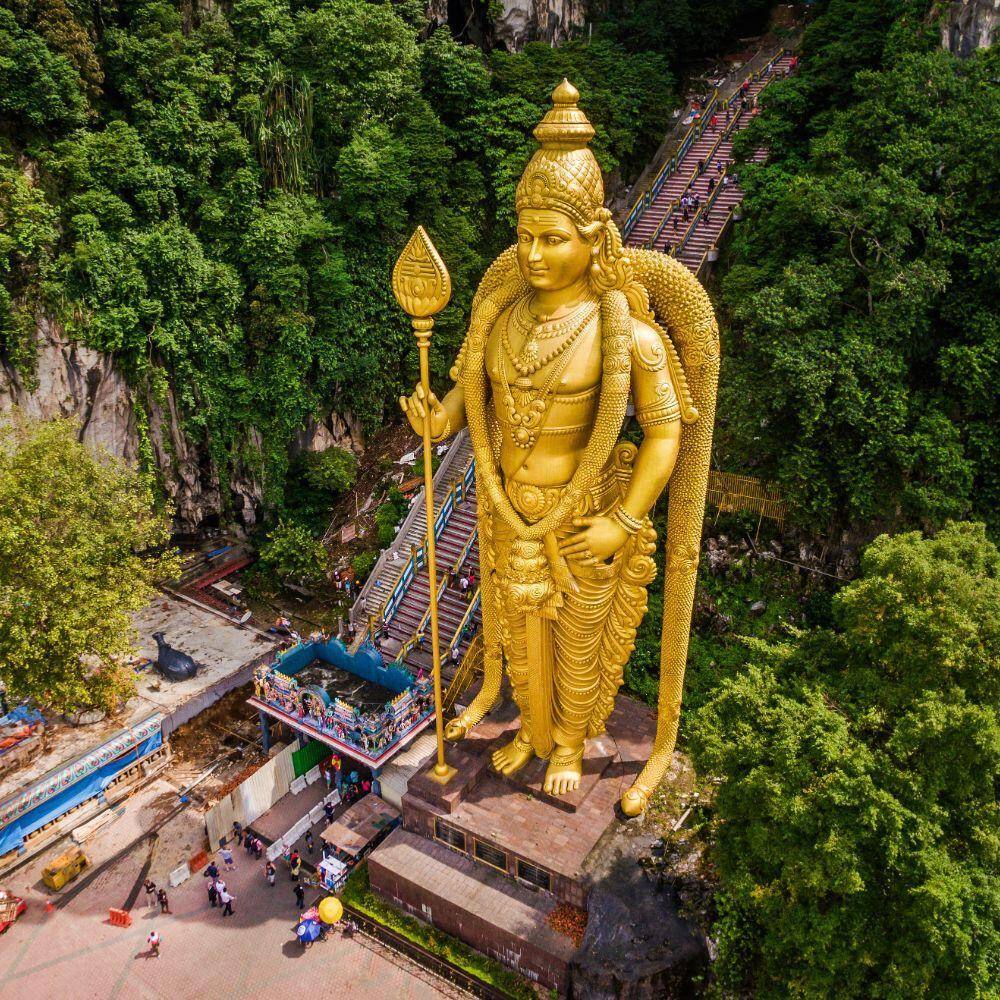 lord murugan statue at entrance of batu case in malaysia 