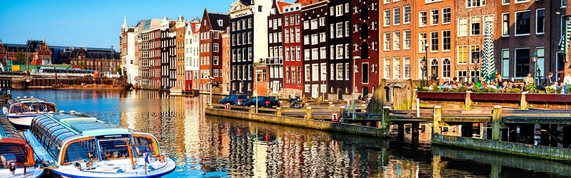 houses by the canal in amsterdam 