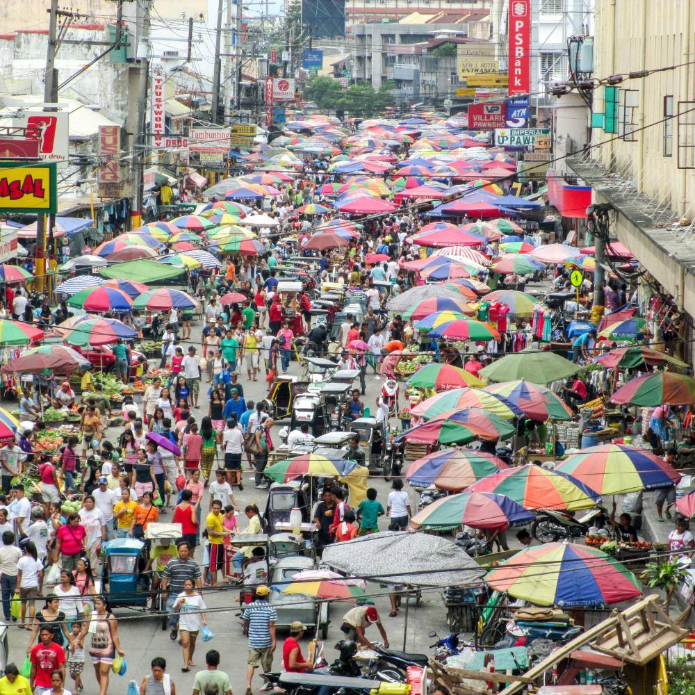 a busy street market in manila