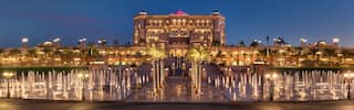emirates palace facade lit up at night