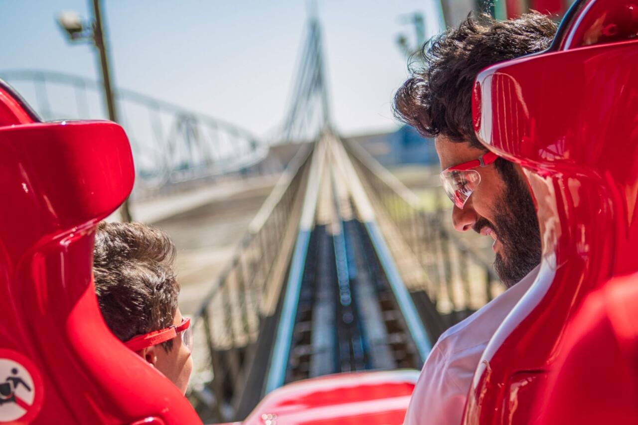 man and child on the formula rossa rollercoaster at ferrari world in abu dhabi