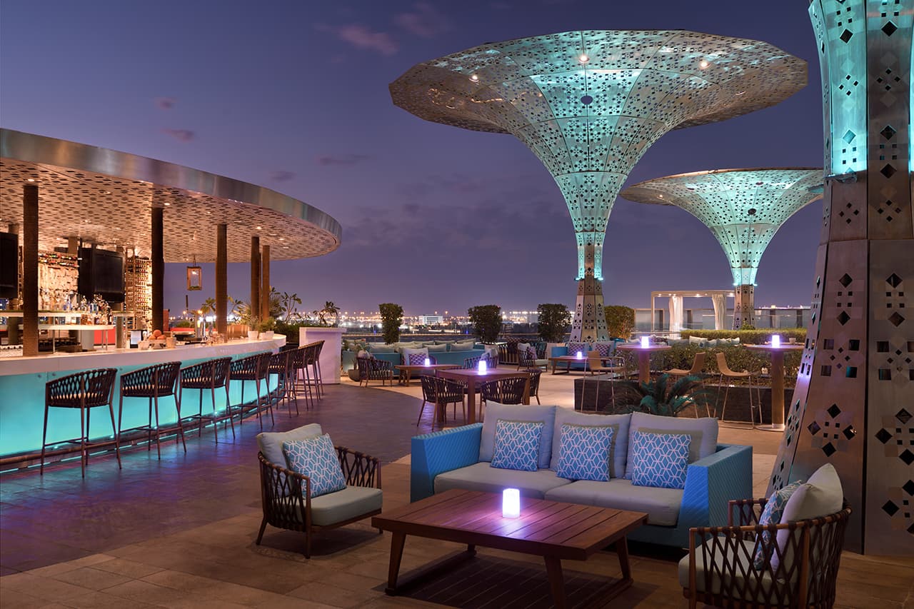 outdoor terrace at the rosewood abu dhabi overlooking the sea