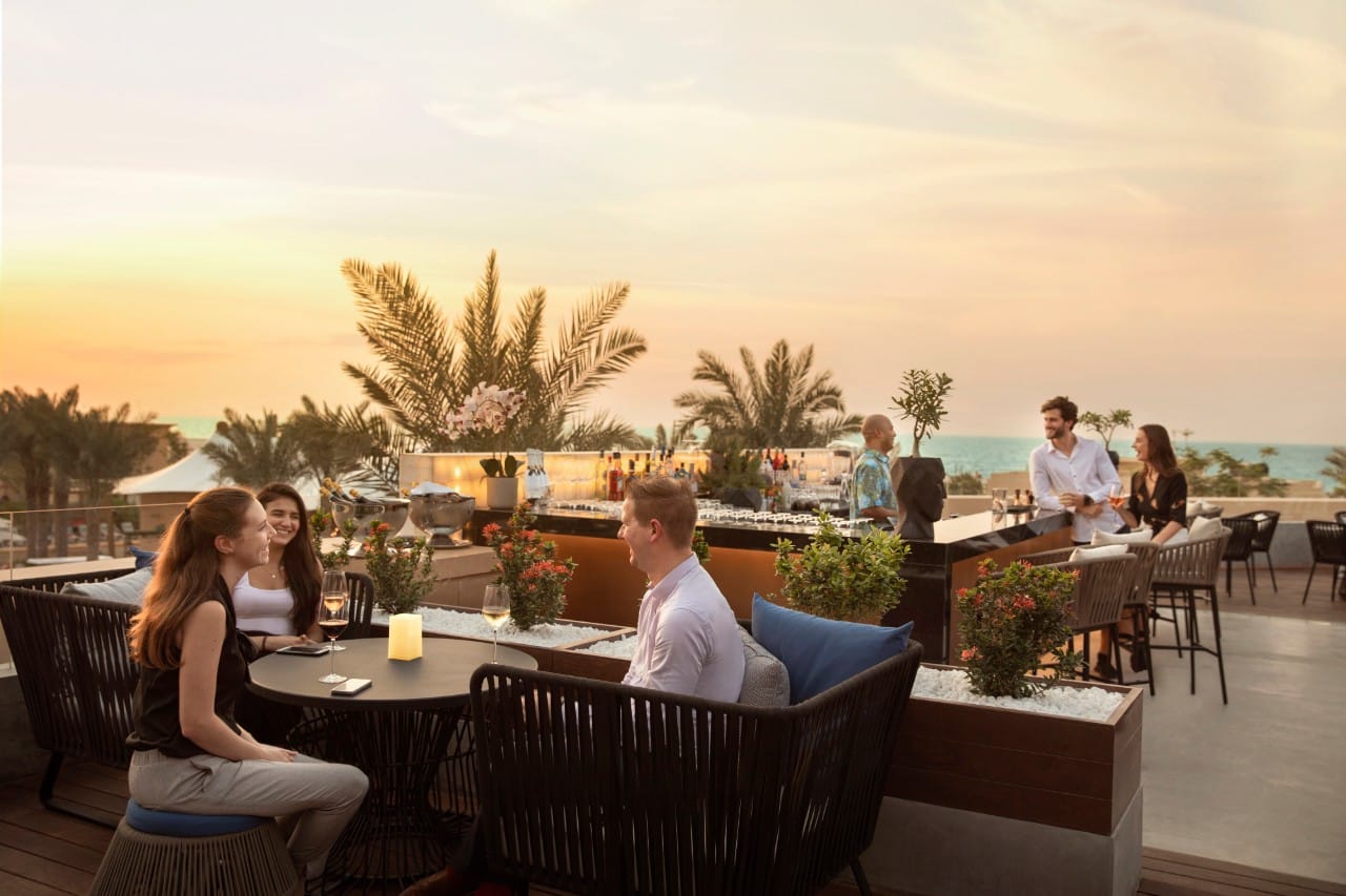 guests enjoying in a restaurant in saadiyat rotana resort