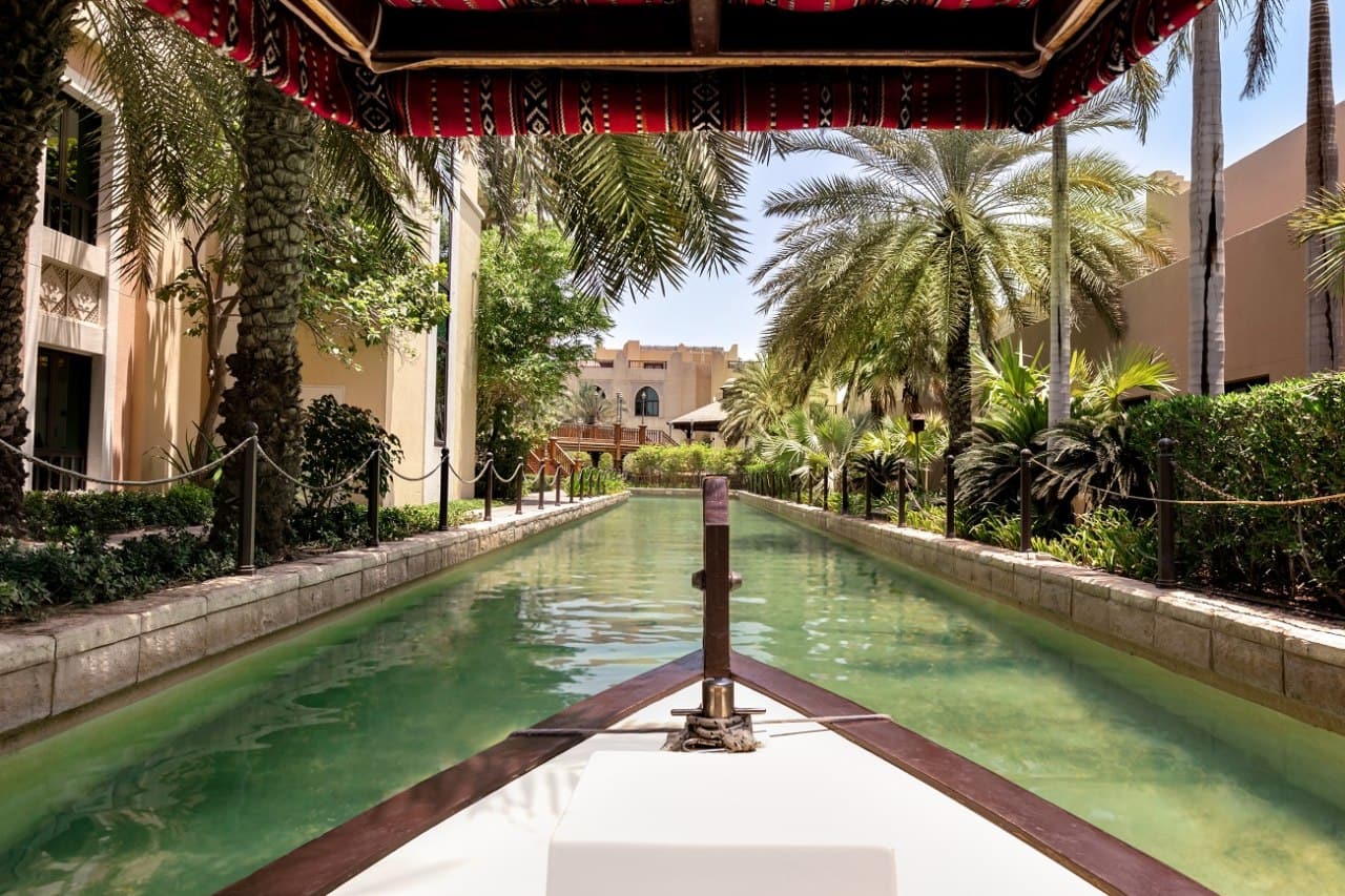 boat on canal shangri la hotel abu dhabi