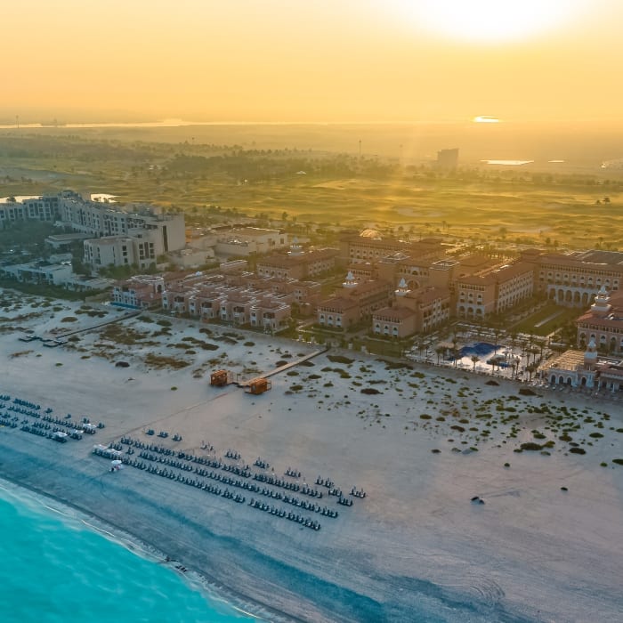 aerial shot of rixos hotel and beach