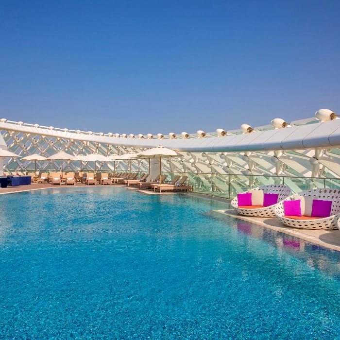w abu dhabi rooftop pool with sunbeds