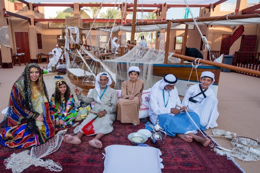 family dressing up at heritage village abu dhabi