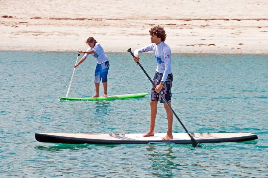 couple paddleboarding