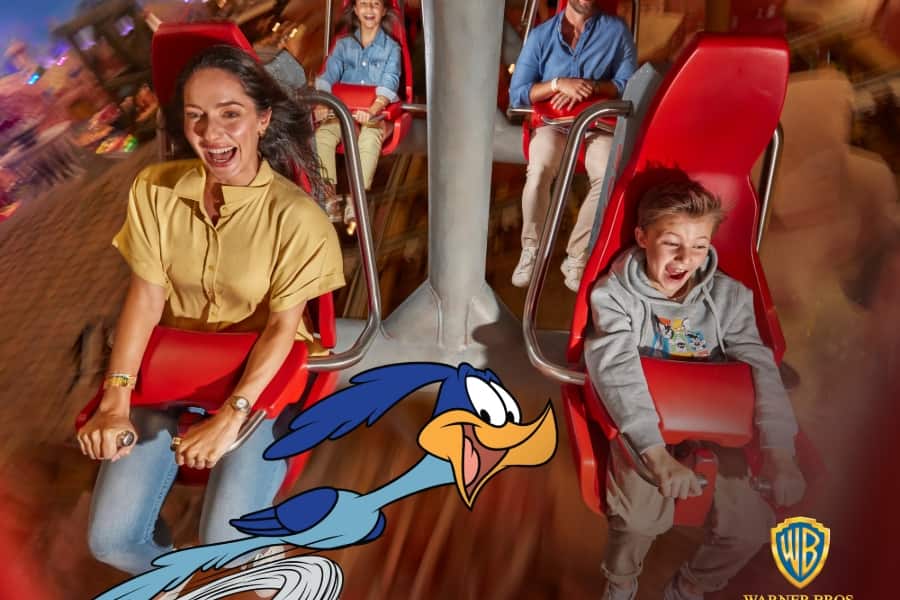 children on a ride at warner bros world abu dhabi