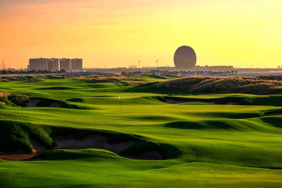 view of abu dhabi from yas links golf club