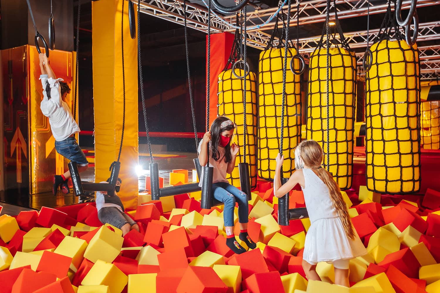 family looking into the window of a toy shop