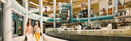 women walking in the yas mall in abu dhabi