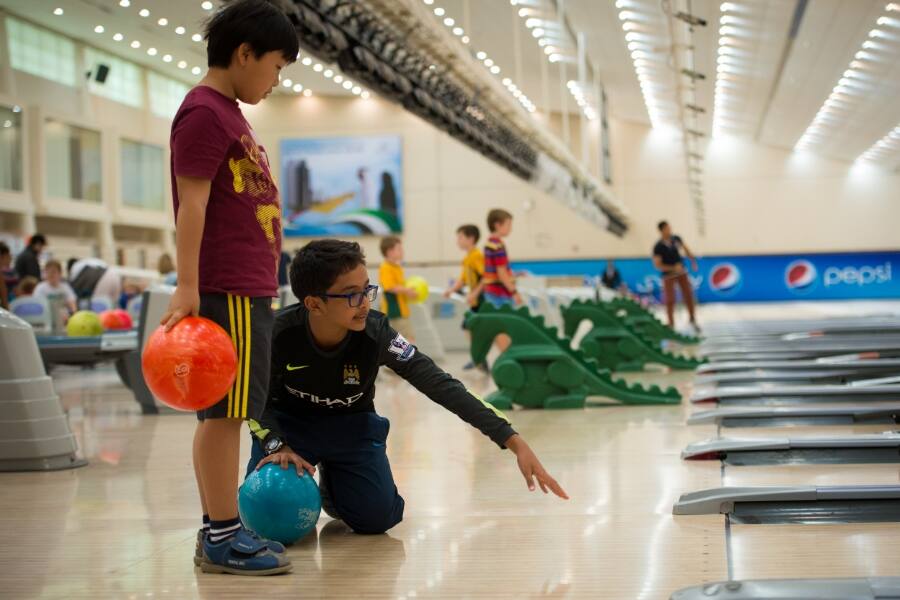 children in bowling alley
