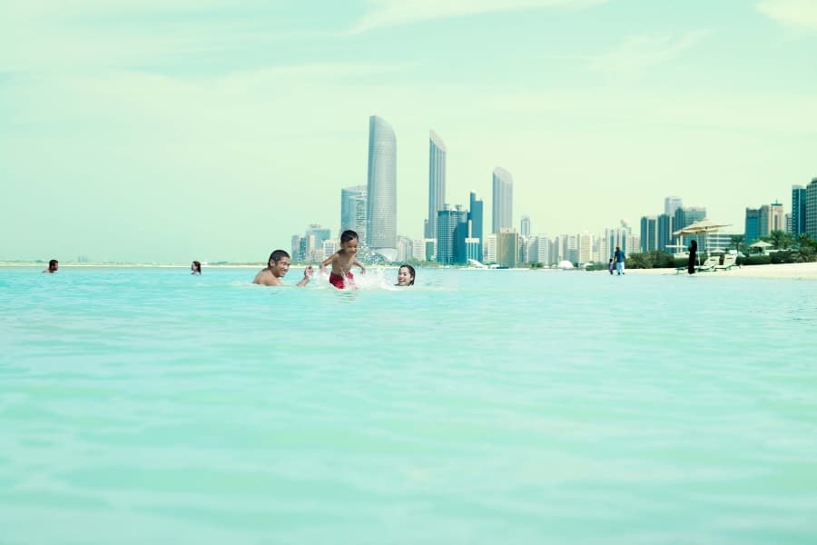 family playing in the water 