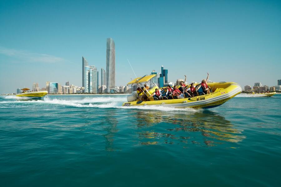 boat tour abu dhabi group of people on a boat