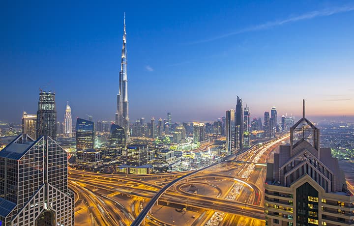 high up view of dubai and its roads at dusk united arab emirates