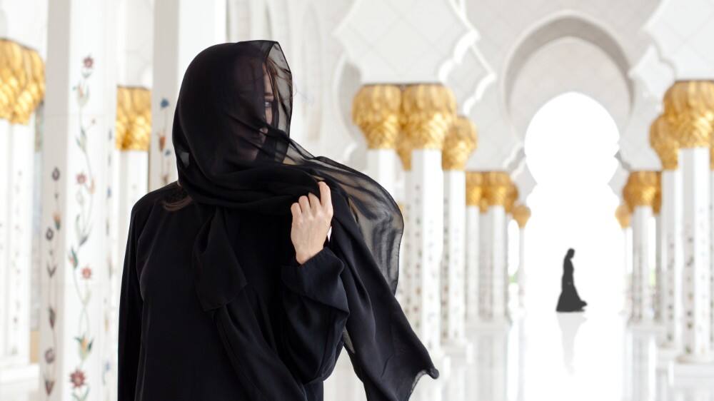 muslim woman in sheikh zayed grand mosque abu dhabi uae