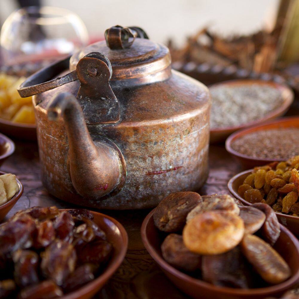 bedouin tea nuts and dried fruit on tray in uae