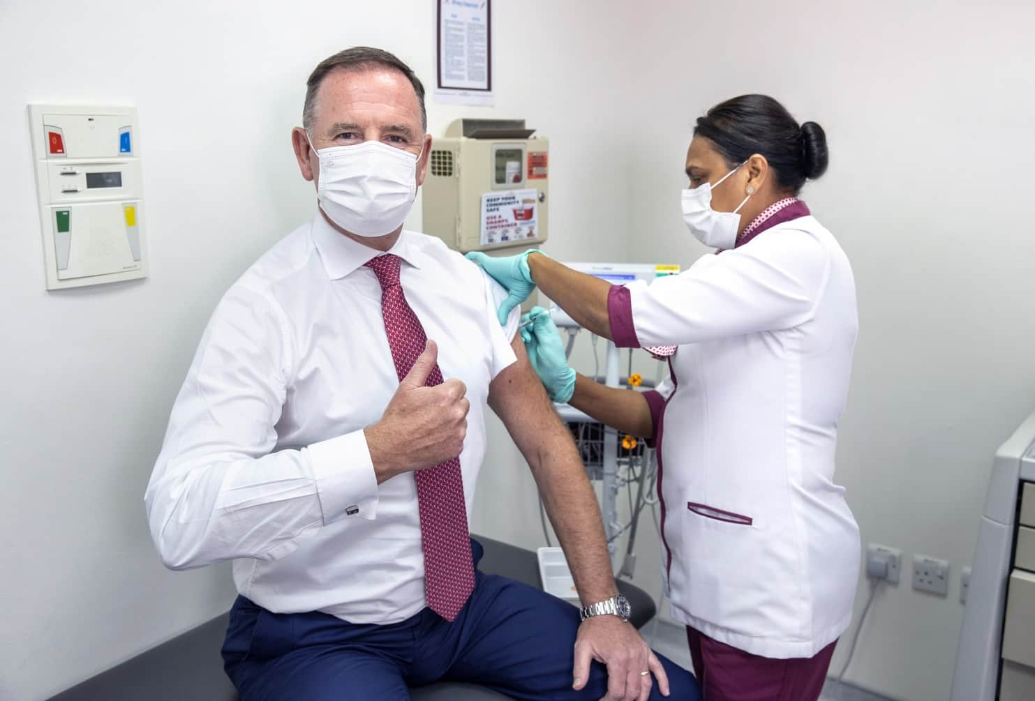 Tony Douglas, Etihad's Group Chief Executive Officer, takes COVID-19 vaccine
