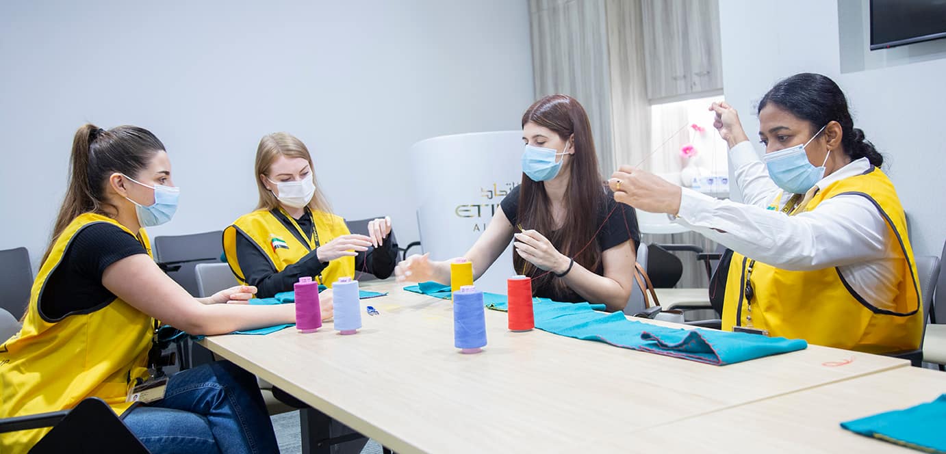 Etihad Aviation Group distributes scarves